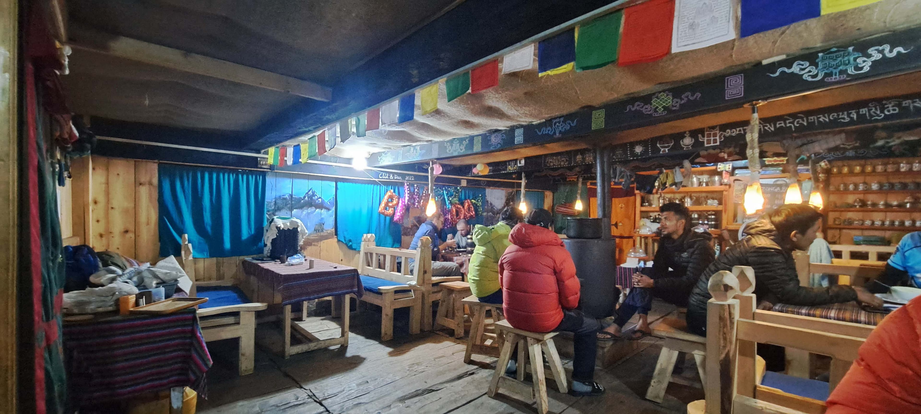 Trek 8586 Trekkers in ghunsa hotel talking about essence of the Kanchenjunga Region’s beauty