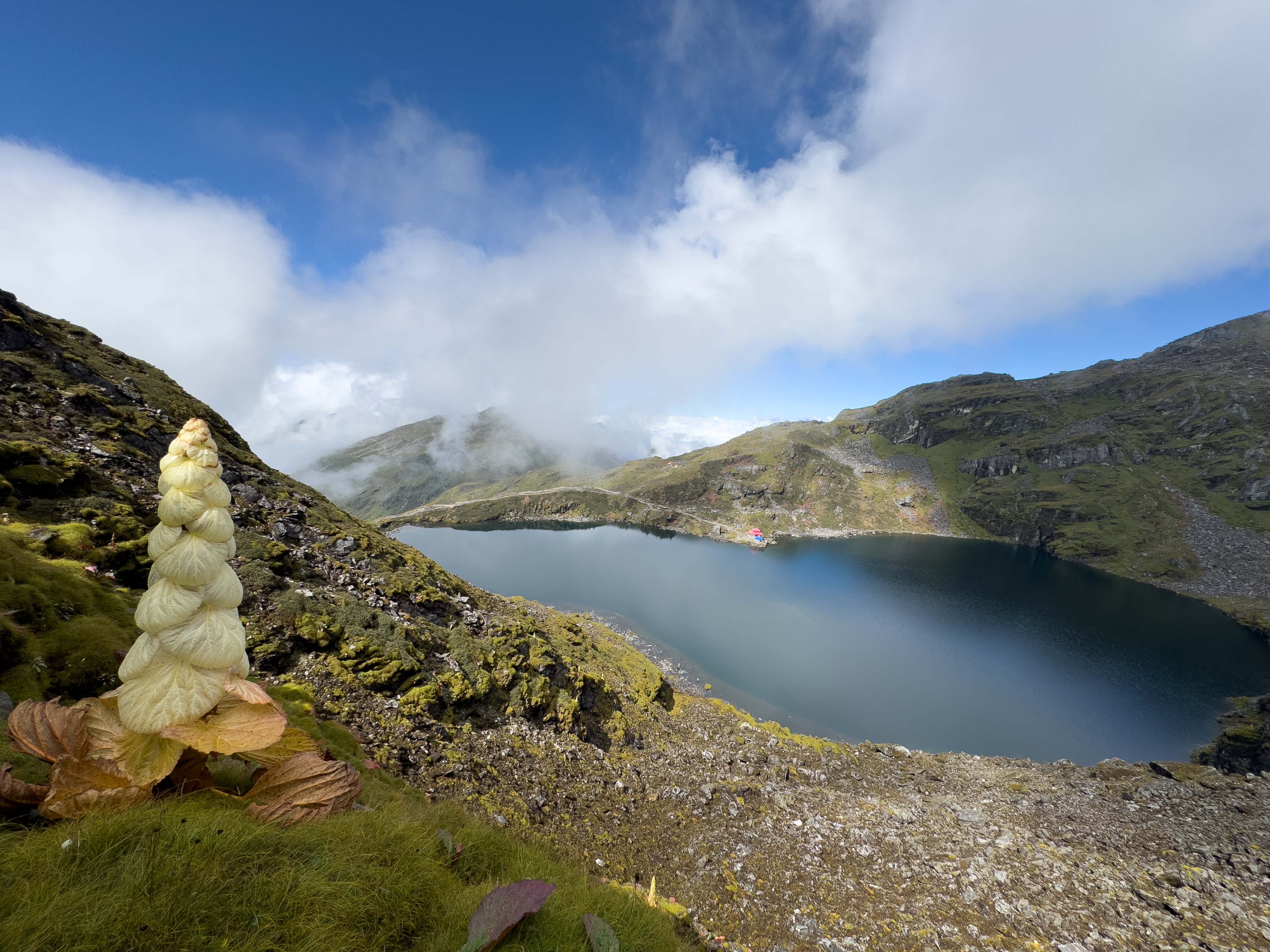 A side view of Kenjo and Timbung Pokhari, a serene destination in the Kanchenjunga Region, with Trek 8586